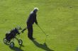 senior man playing golf