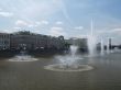 Fountains on the river in summer day