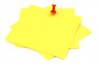 three yellow sticky notes