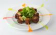 Fried beef with pineapple and salad.