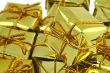 stack of golden gifts