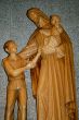 woodcarved jesus and children