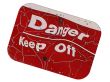 danger sign with raised lettering