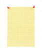 yellow blank thumbtacked squared paper page