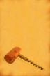 vintage corkscrew against stained old paper #2