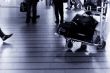 people traveling at the airport