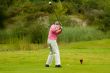 senior man playing golf