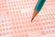 lottery ticket and pencil