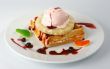 Dessert with pineapple and ice-cream.