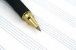 stave and ballpoint pen