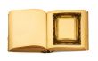 decorative frame lying on an open book