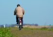 man on bicycle in spring
