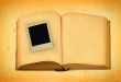 old book with empty photo frame inside