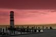 Two people sitting at a lighthouse