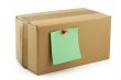cardboard box with pinned note
