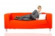 Woman on red couch