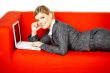 Woman on red couch