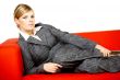 Woman on red couch