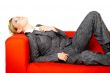 Woman on red couch