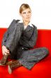 Woman on red couch