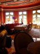 Formal Waiter in Elegant Dining Room