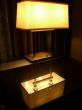 Lamp reflected in desk