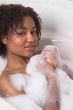 Beautiful woman having a bath