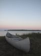 canoe on beach at sunset