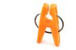 orange clothes peg