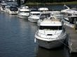 Boats moored at river side jetty