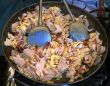 Wok with meat eggs and fish