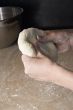 pressing dough