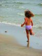 girl running on the beach