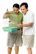 Looking At Birds In Cage