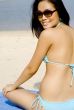 Woman Sitting On Beach