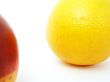 orange and nectarine on the white background