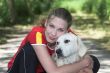 Beautiful woman; walking the dog