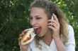 Businesswoman; taking a healthy bite
