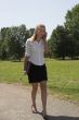 Pretty businesswoman walking in the park