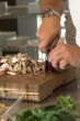 Chopping the mushrooms