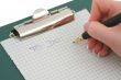 female hand writing TO DO list