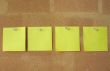 post-it notes pinned in line