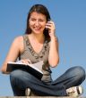 girl taking notes