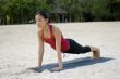 Plank Pose On Beach