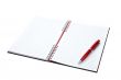 Blank notebook sheet with pen