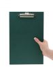 hand holding empty clipboard
