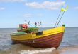 old fishing boats against beautiful sky