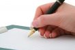 writing hand on white background