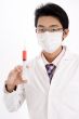 Doctor With Syringe