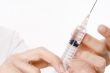 Hands and Syringe